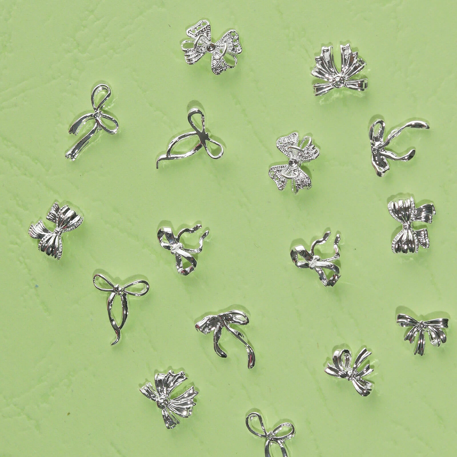 60pcs-metal-bow-nail-charms-set-silver-show