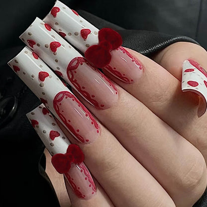 red-velvet-bow-charms-nail-design